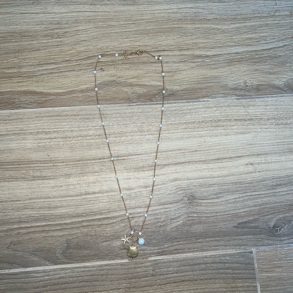 Gold and White Starfish Pendant Necklace